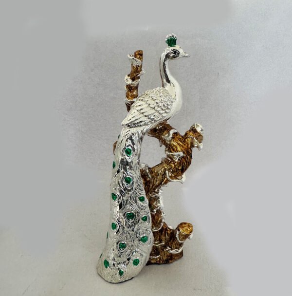 Artistic Silver Peacock sitting on a tree trunk | 10″ height| Saah Gifts